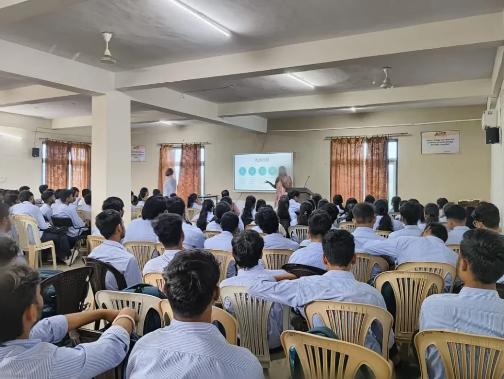 Students seated inside a college hall during a Project Sankalp awareness session conducted in Bhopal.